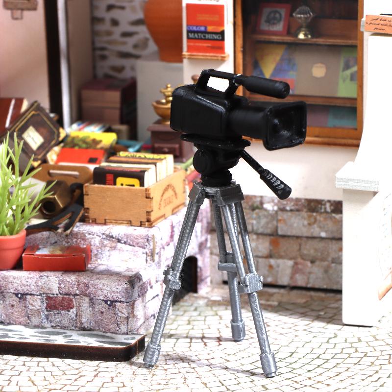 Home Security Camera - Mini Treppiede per Videocamera Modello in